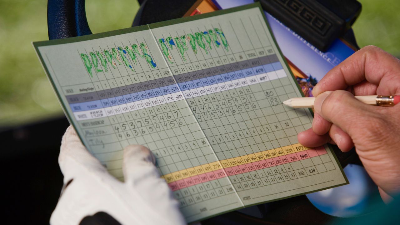 Player filling in scorecard