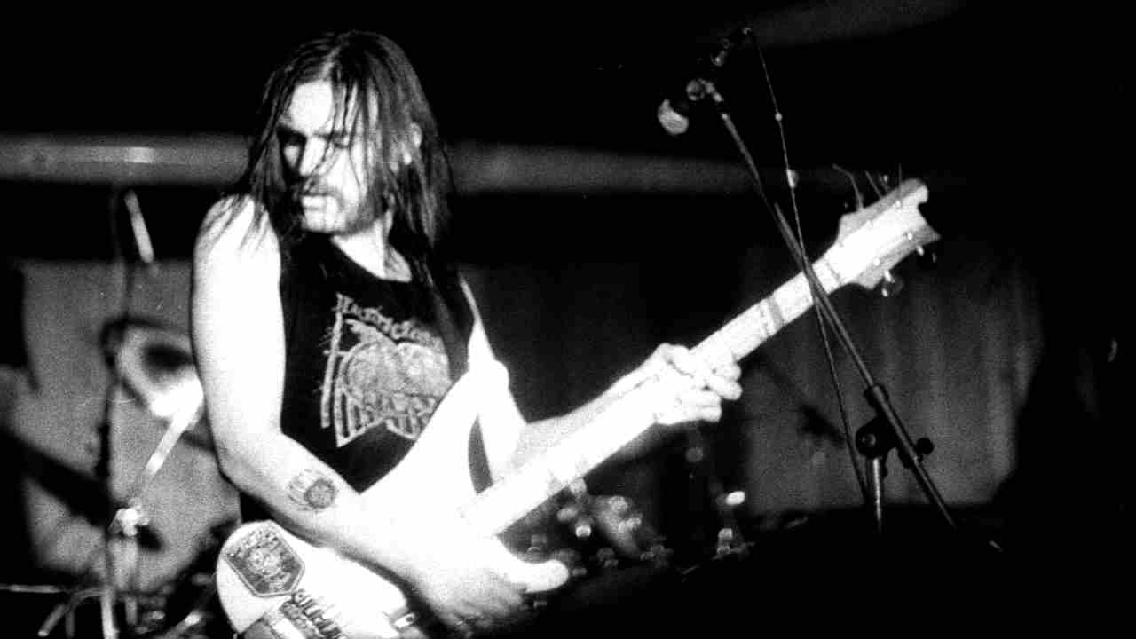 Lemmy of Motorhead performing onstage in the early 1980s
