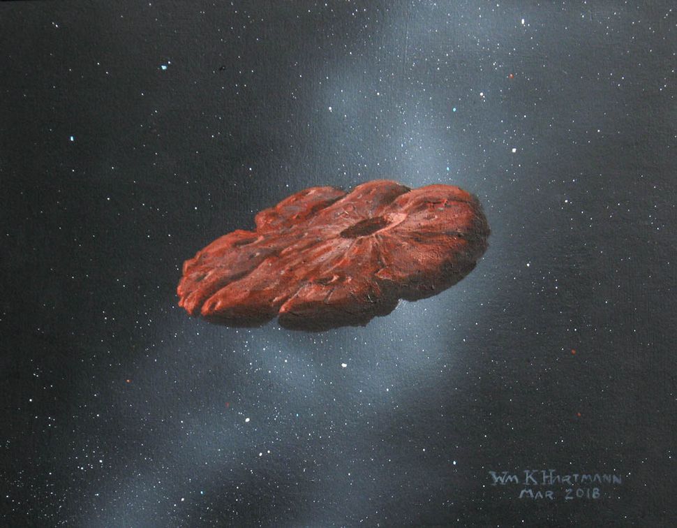 Interstellar object 'Oumuamua is a pancake-shaped chunk of a Pluto-like planet