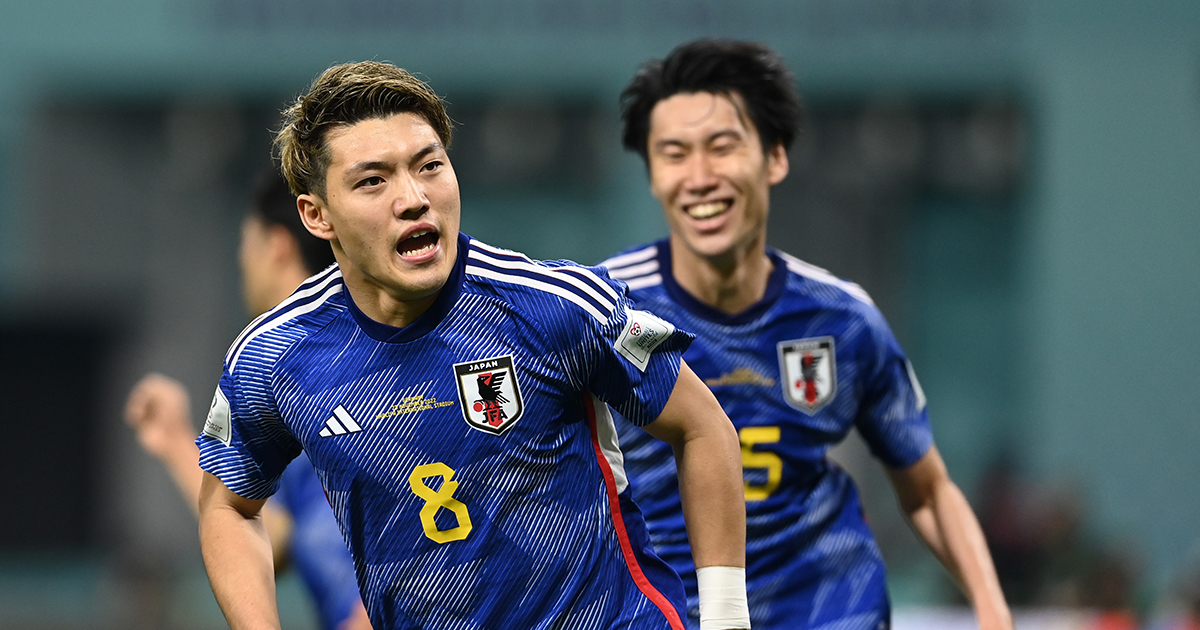 Japan's Ritsu Doan celebrates after scoring their team's first goal during the FIFA World Cup Qatar 2022 Group E match between Germany and Japan at Khalifa International Stadium on November 23, 2022 in Doha, Qatar.
