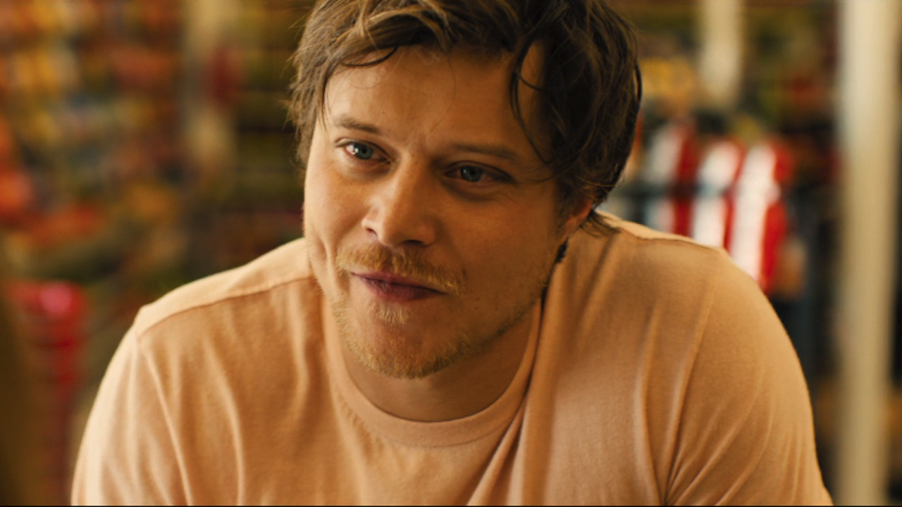 Rudy Pankow as Scotty at dollar store meeting Kenna in Reminders of Him 