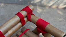 Dhammada collective's chair made from cardboard tubes tied together with rope