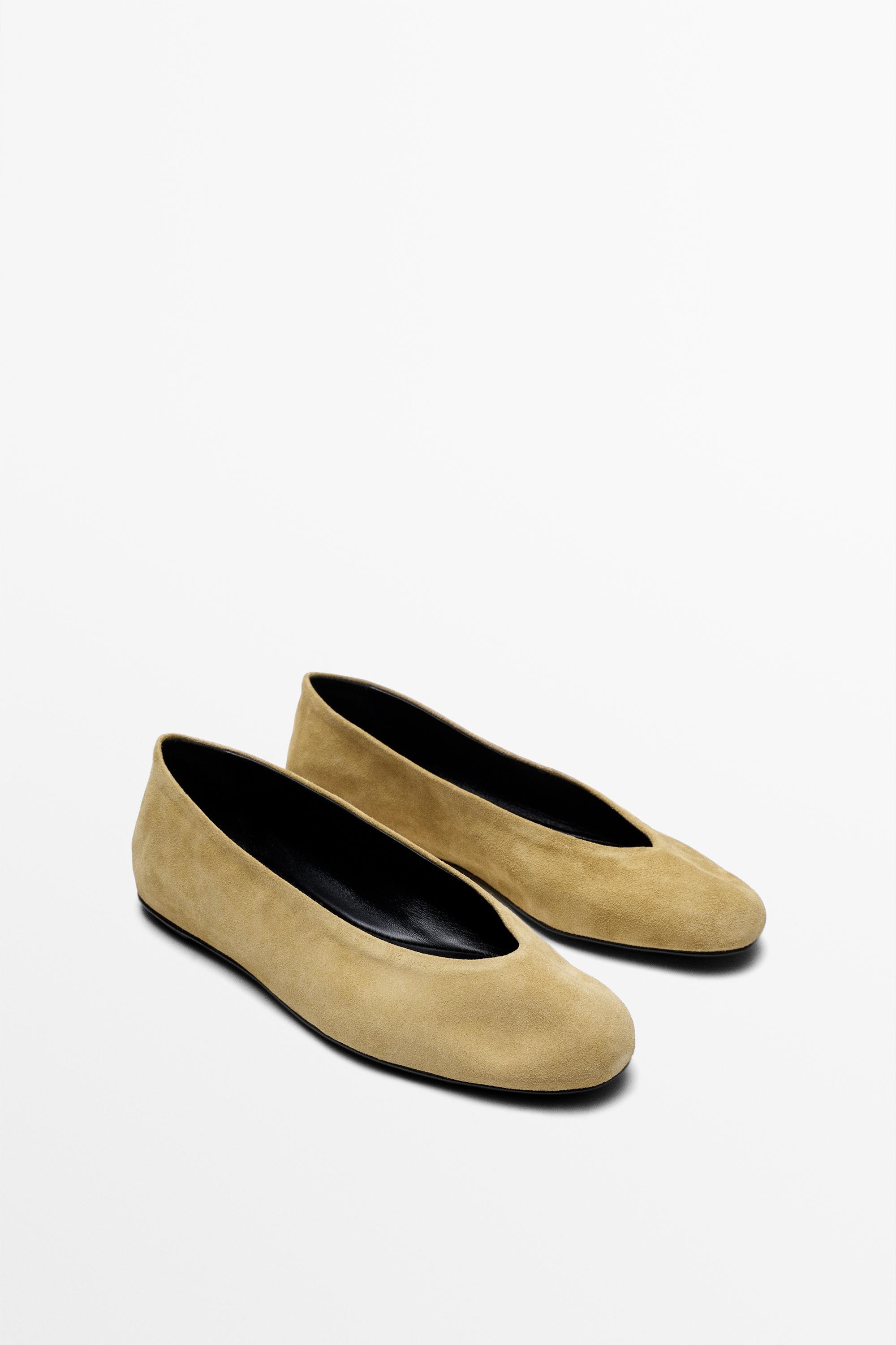 An image of yellow beige suede ballet flats from Massimo Dutti