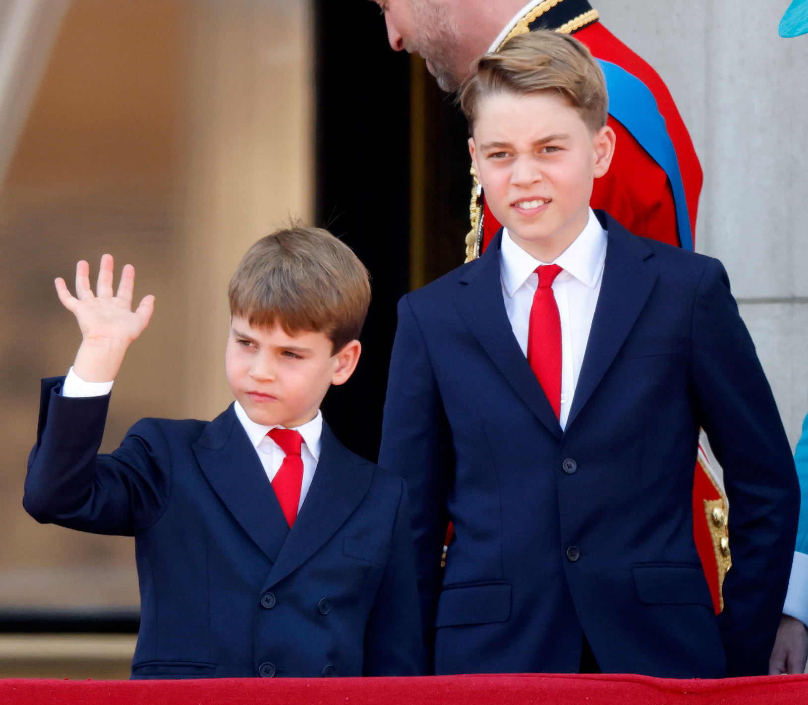 Prince Louis of Wales and Prince George of Wales watch an RAF flypast from the balcony of Buckingham Palace after attending Trooping The Colour 2025 (Photo by Max Mumby/Indigo/Getty Images)