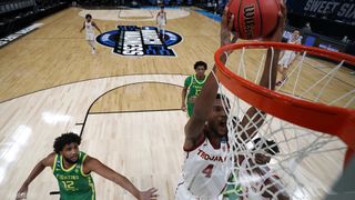 Evan Mobley #4 of the USC Trojans dunks the ball against the Oregon Ducks in the first half of their Sweet Sixteen round game of the 2021 NCAA Men's Basketball Tournament at Bankers Life Fieldhouse on March 28, 2021 in Indianapolis, Indiana.