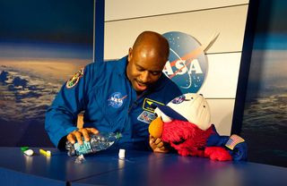 Former astronaut Leland Melvin talked to Elmo