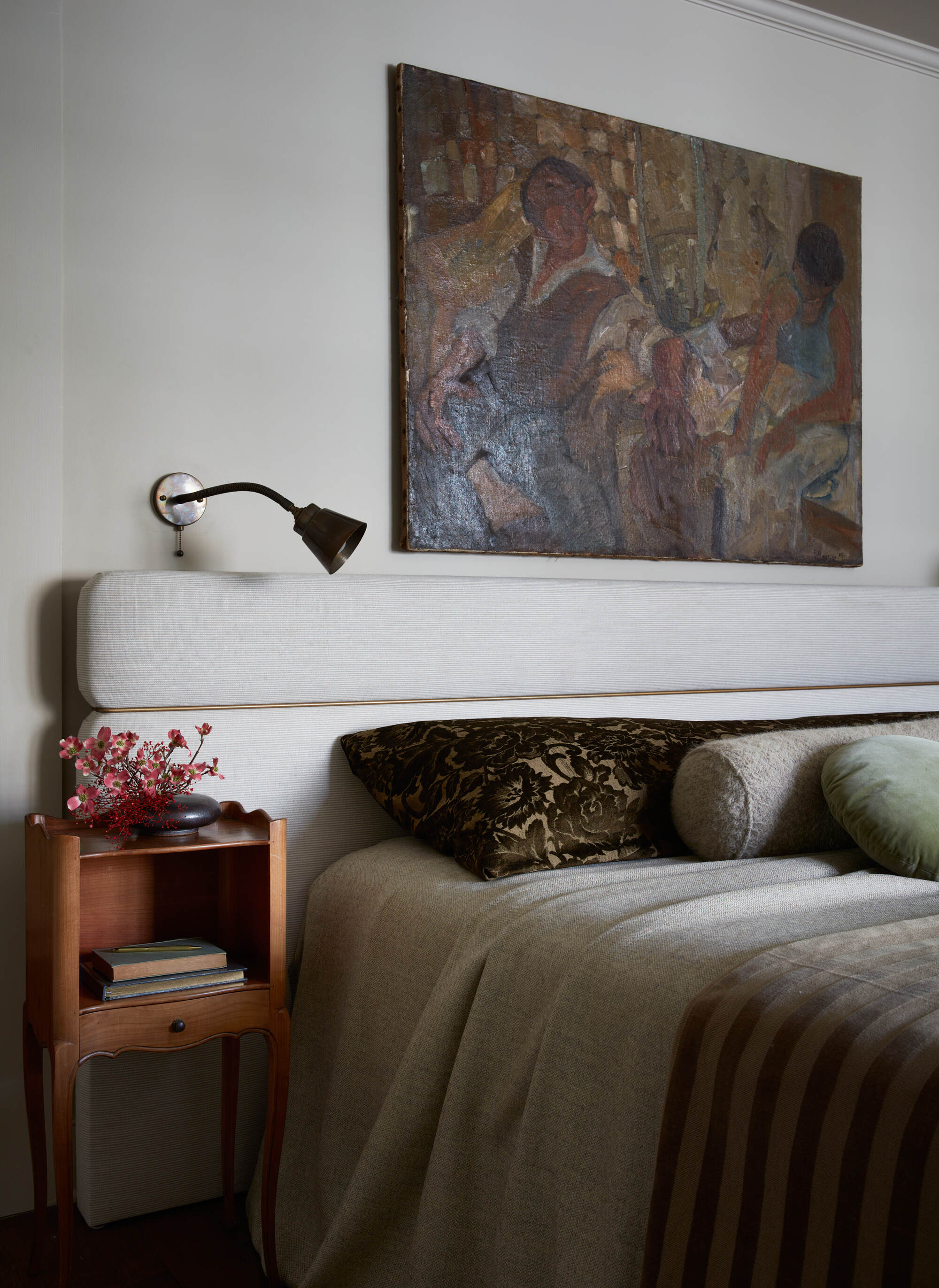 a muted bedroom with flower frog