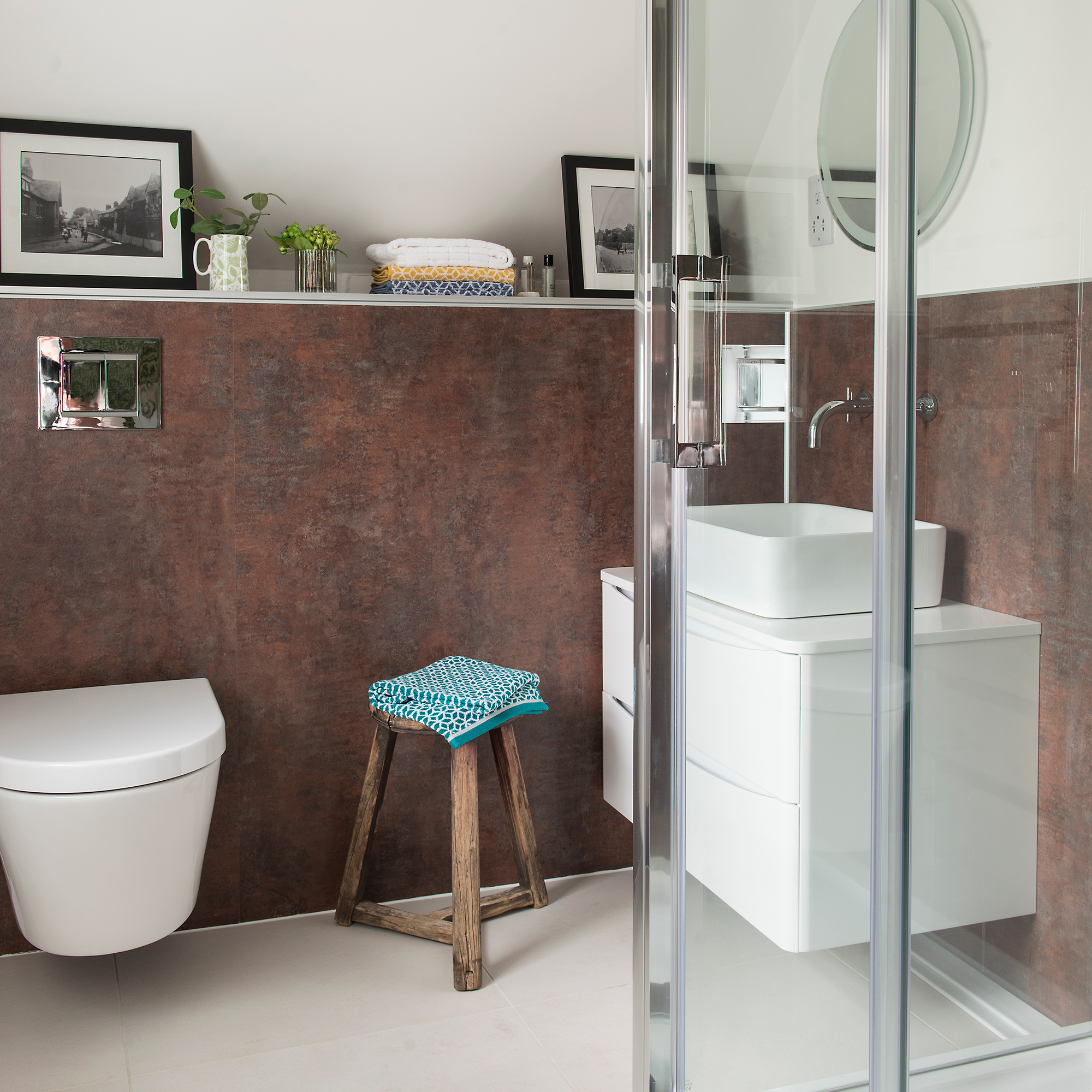 ensuite bathroom with shower and  bronze effect tiles
