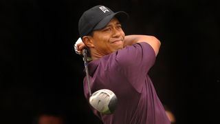 Tiger Woods holds his finish on a drive in 2005