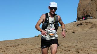 Ultra runner Harry Jones running in the desert