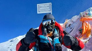 Mitch Hutchcraft on the summit of Everest