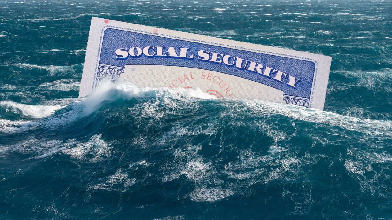 A Social Security card floats in rough water.