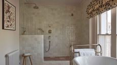 shower with zellige tiles and bath in the foreground