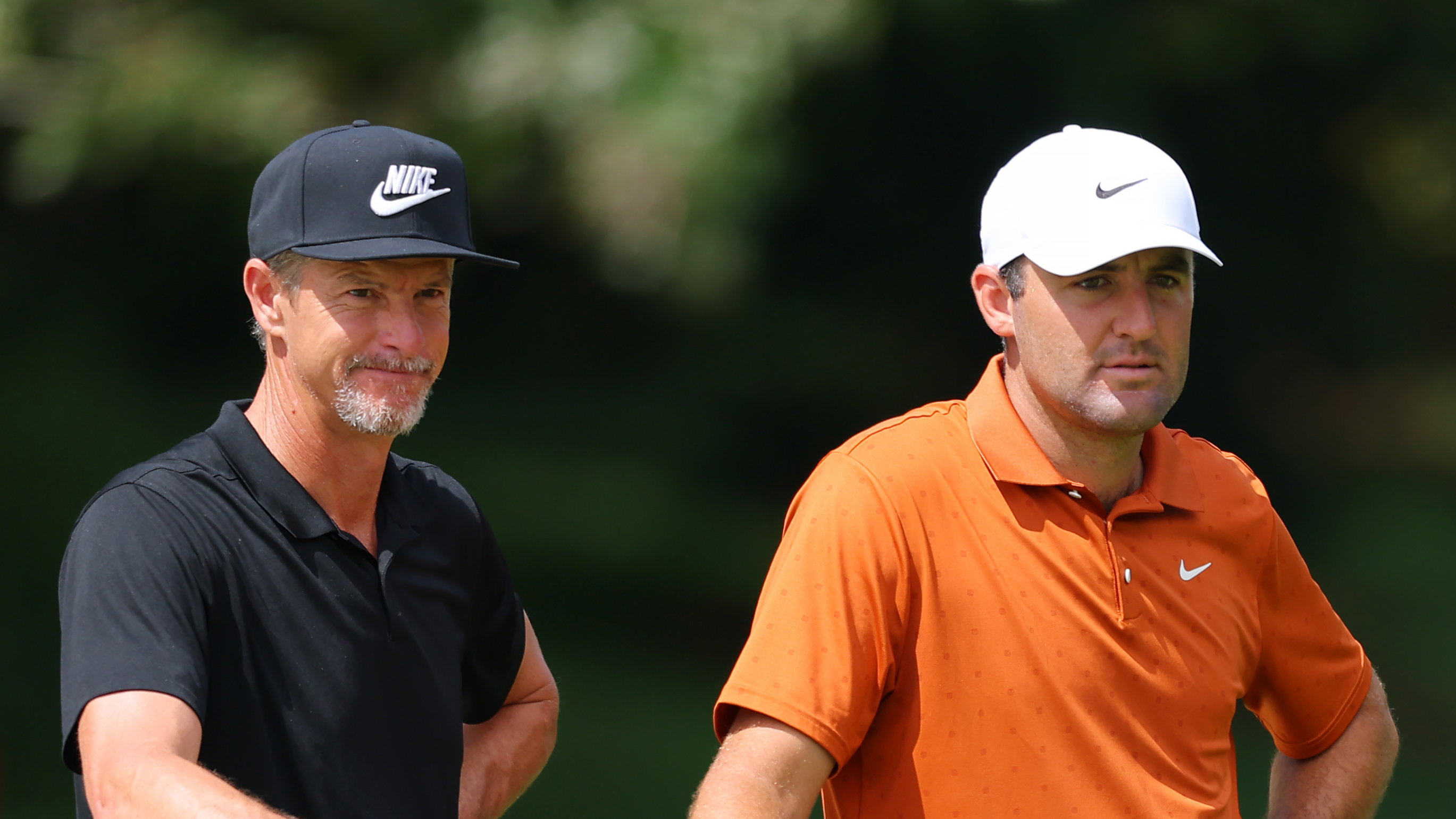 Ted Scott (left) and Scottie Scheffler look on during a practice round at the 2025 PGA Championship
