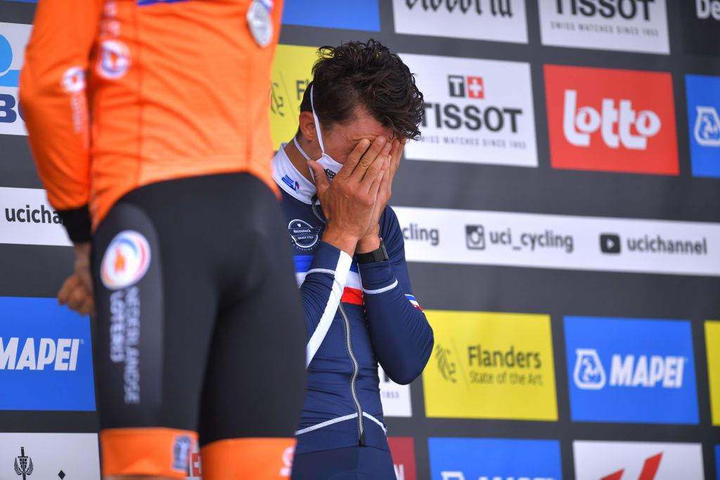 LEUVEN BELGIUM SEPTEMBER 26 Gold medalist Julian Alaphilippe of France celebrates winning during the medal ceremony after the 94th UCI Road World Championships 2021 Men Elite Road Race a 2683km race from Antwerp to Leuven flanders2021 on September 26 2021 in Leuven Belgium Photo by Luc ClaessenGetty Images