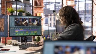 Woman using video editing software