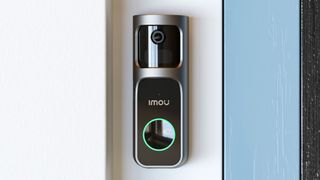 IMOU video doorbell installed beside door