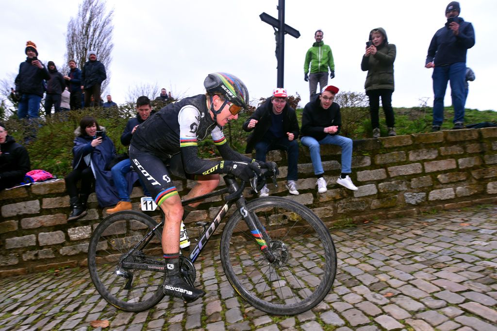 NINOVE BELGIUM FEBRUARY 29 Annemiek Van Vleuten of The Netherlands and Team MitcheltonSCOTT World Champion Jersey Wall of Geraardsbergen De Muur Fans Public Cobblestones during the 75th Omloop Het Nieuwsblad 2020 Women Race a 1229km race from Ghent to Ninove OmloopHNB OHN20 OHNwomen on February 29 2020 in Ninove Belgium Photo by Luc ClaessenGetty Images
