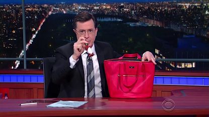 Stephen Colbert digs for host sauce in Hillary's purse