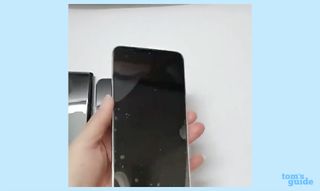 A leaked video showing a user handling the Samsung Galaxy S22 with the display face-up.