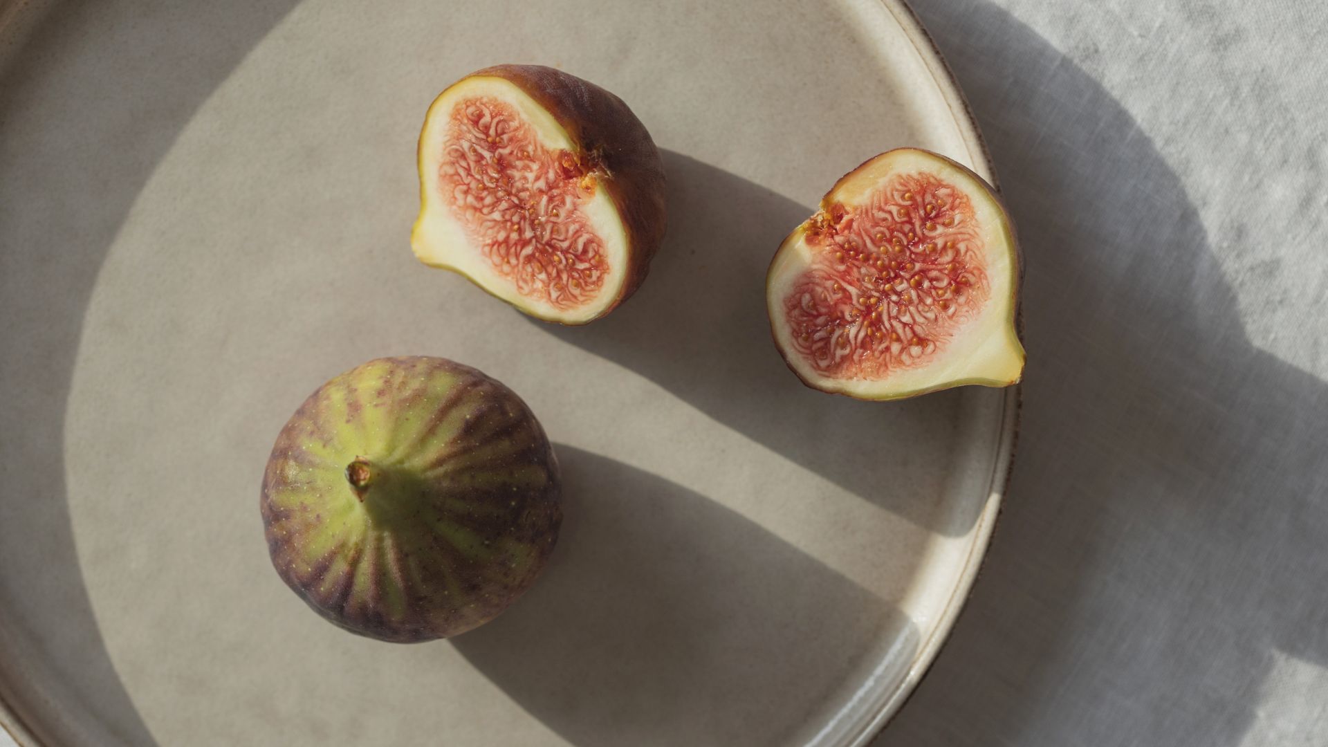 Figs sitting on plate