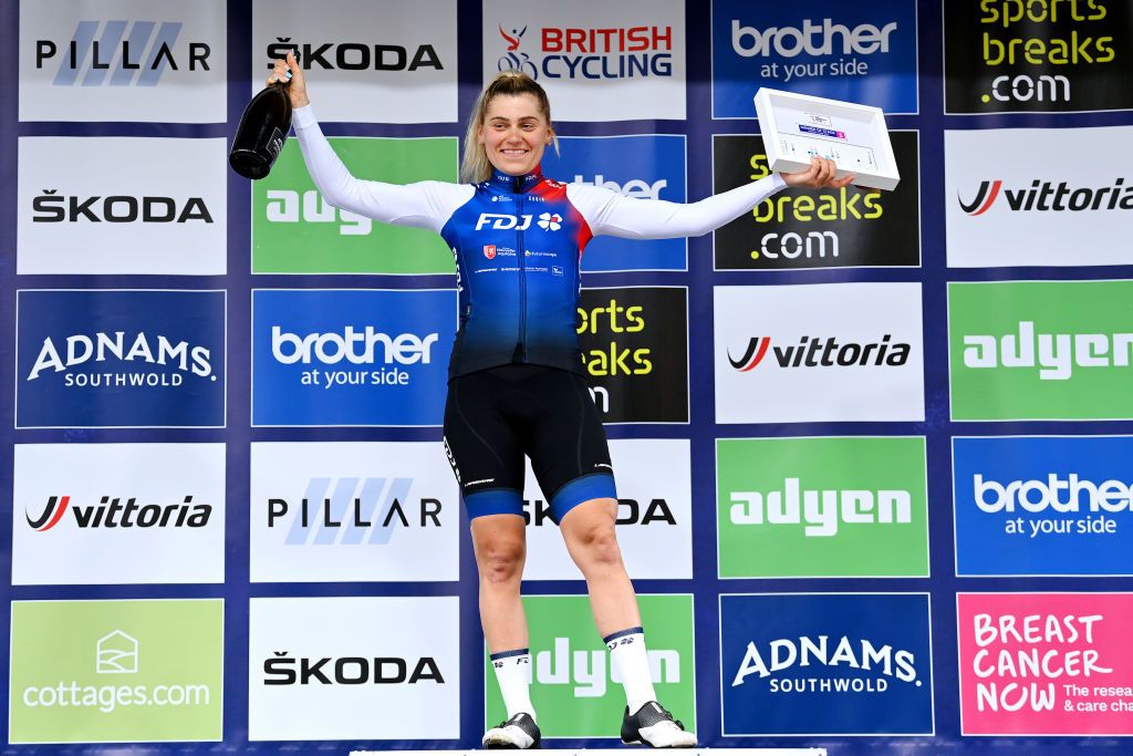 BURY ST EDMUNDS ENGLAND JUNE 06 Clara Copponi of France and Team FDJ Nouvelle Aquitaine Futuroscope celebrates winning the stage on the podium ceremony after the 8th The Womens Tour 2022 Stage 1 from Colchester to Bury St Edmunds WomensTour UCIWWT on June 06 2022 in Bury St Edmunds England Photo by Justin SetterfieldGetty Images