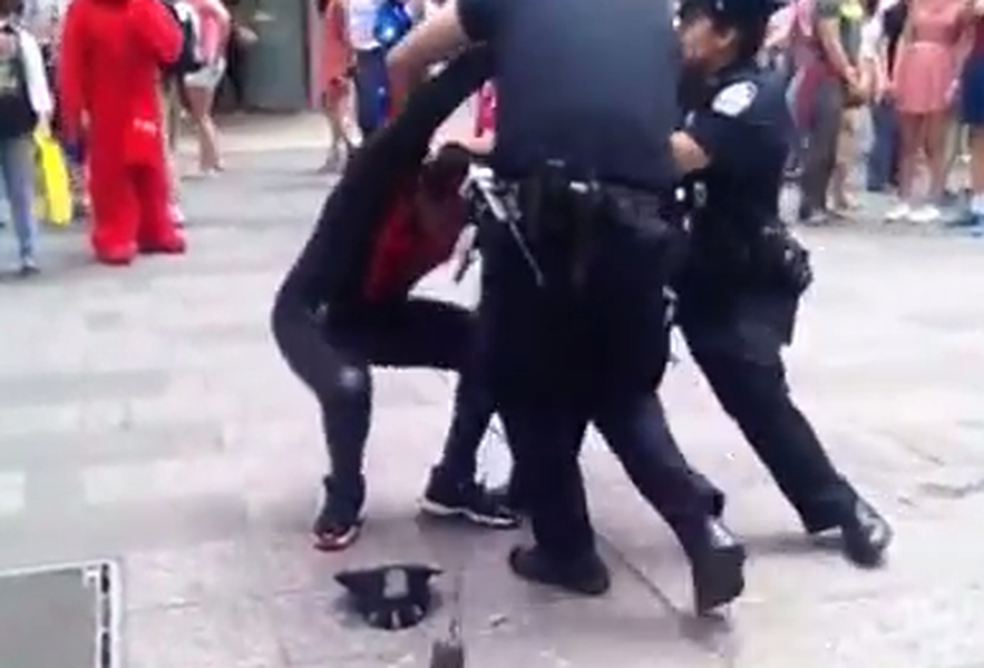 Watch &amp;#039;Spider-Man&amp;#039; punch a cop in the face in Times Square