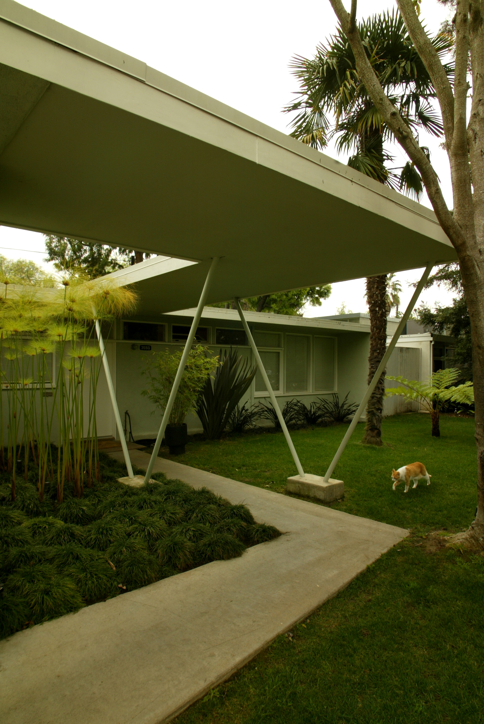 Porch and entrance of a home in West Los Angeles by Gregory Ain