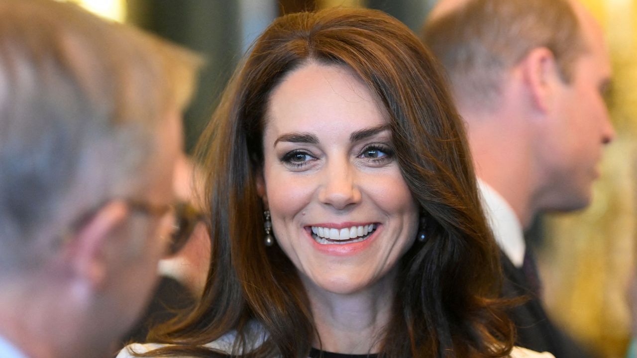 Catherine, Princess of Wales smiles as she speaks with guests during a Realm Governors General and Prime Ministers Lunch