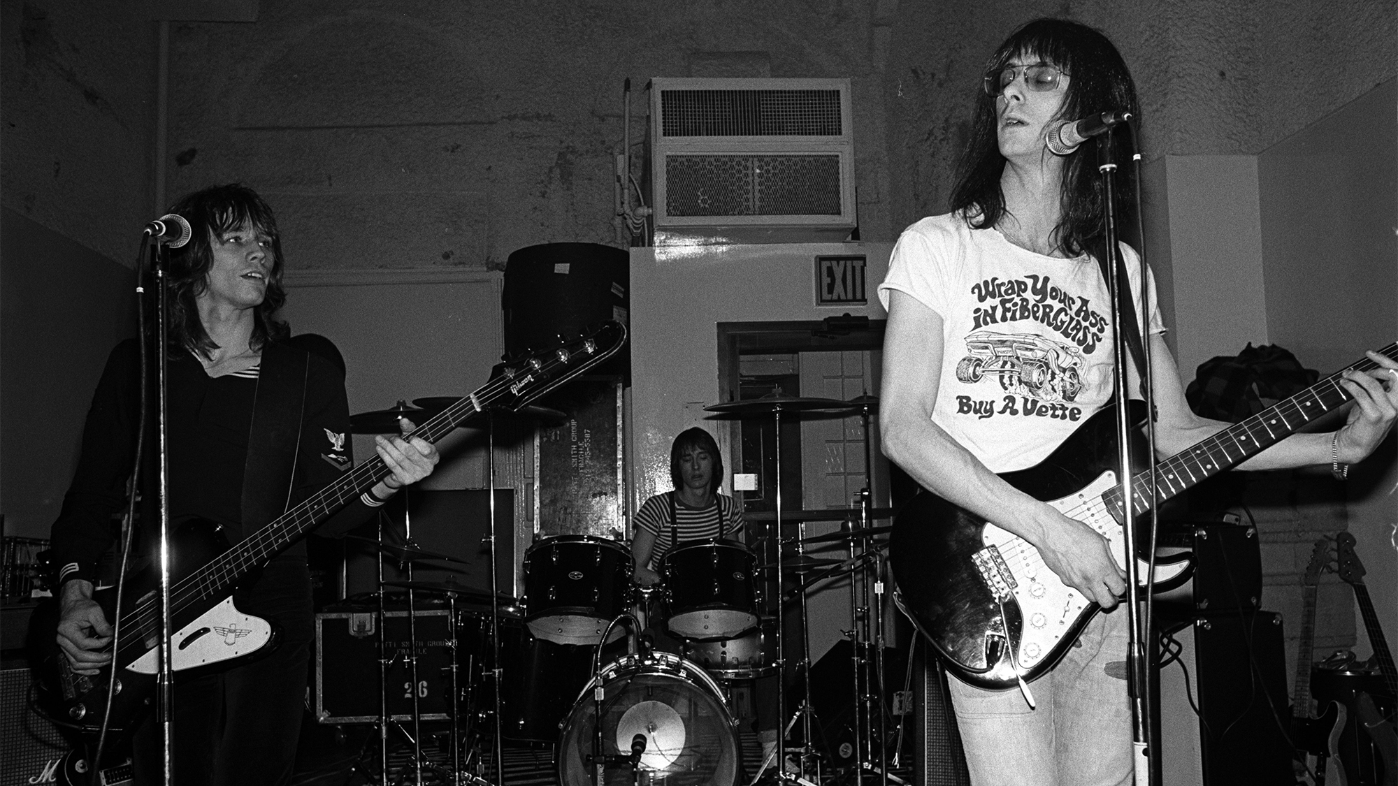 Lenny Kaye (right) Ian Kral (left) and Jay Dee Daugherty (centre) from the Patti Smith Group perform live at CBGB's club in New York City on April 04 1975