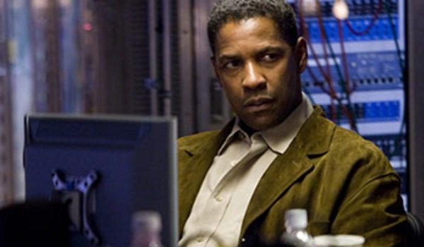 Deja Vu Denzel Washington manning the computer
