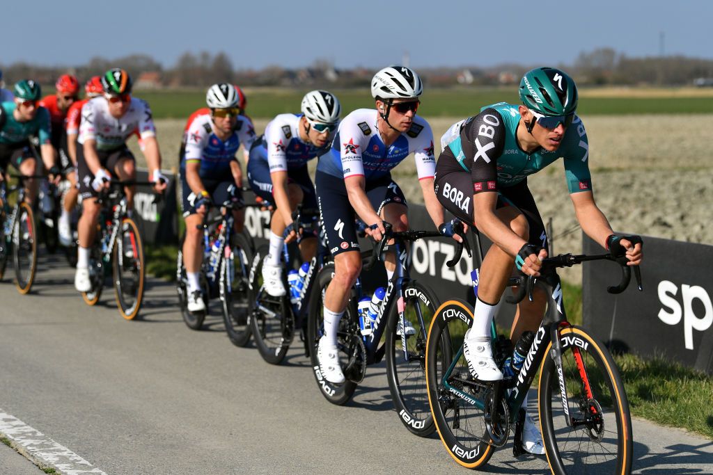 DE PANNE BELGIUM MARCH 23 Nils Politt of Germany and Team Bora Hansgrohe leads the peloton during the 46th Minerva Classic Brugge De Panne 2022 a 2079km stage from Brugge to De Panne MinervaClassic on March 23 2022 in De Panne Belgium Photo by Luc ClaessenGetty Images