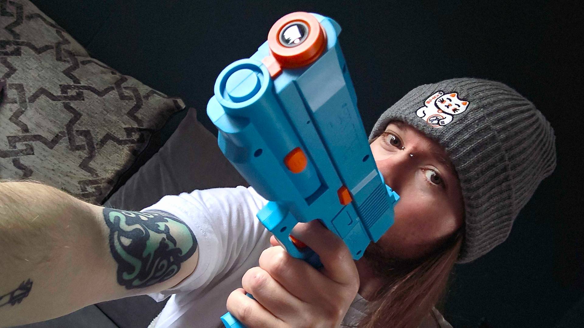 Phil Hayton holding blue G&#039;AIM&#039;E Lightgun.