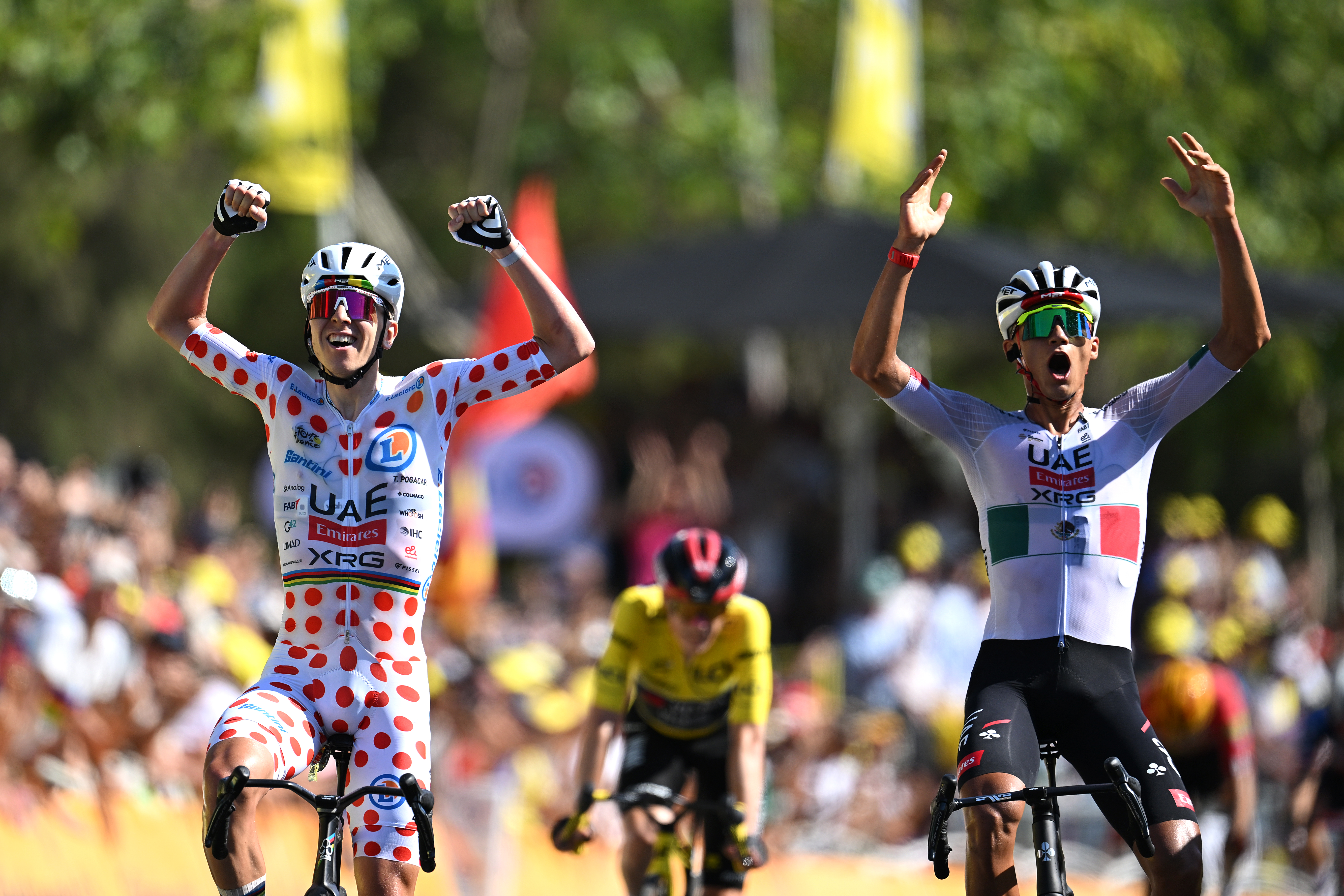 BARCELONA, SPAIN - JULY 05: (L-R) Tadej Pogacar of Slovenia - Polka dot Mountain Jersey and stage winner Isaac Del Toro of Mexico and UAE Team Emirates - XRG celebrate at finish line during the 113th Tour de France 2026, Stage 2 a 168.5km stage from Tarragona to Barcelona 109m / #UCIWT / on July 05, 2026 in Barcelona, Spain. (Photo by Tim de Waele/Getty Images)