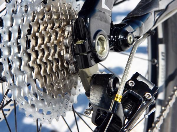 In the event of a crash, the derailleur hanger isn't meant to break or bend but rather the alloy bolt that attaches it. Specialized conveniently includes an extra one with the bike, too.
