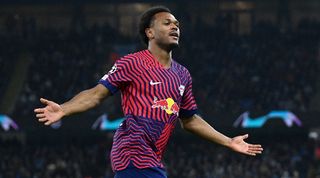 Lois Openda celebrates after scoring for RB Leipzig against Manchester City in the Champions League in November 2023.