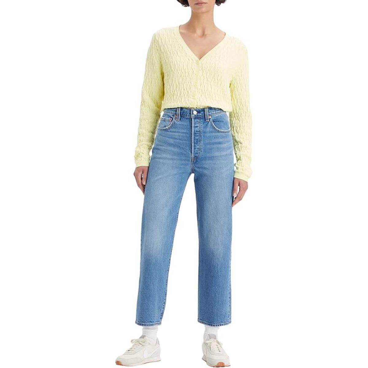 Levi's woman with straight chest and ankles, dancing around, 27W / 27L