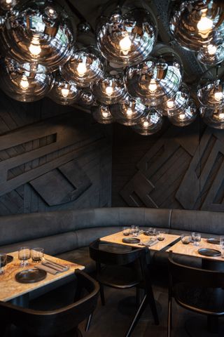 the coal office restaurant dining room by Tom Dixon