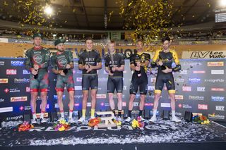 Champagne on the Revolution Champions League podium for Ed Clancy and Jon Mould of JLT Condor