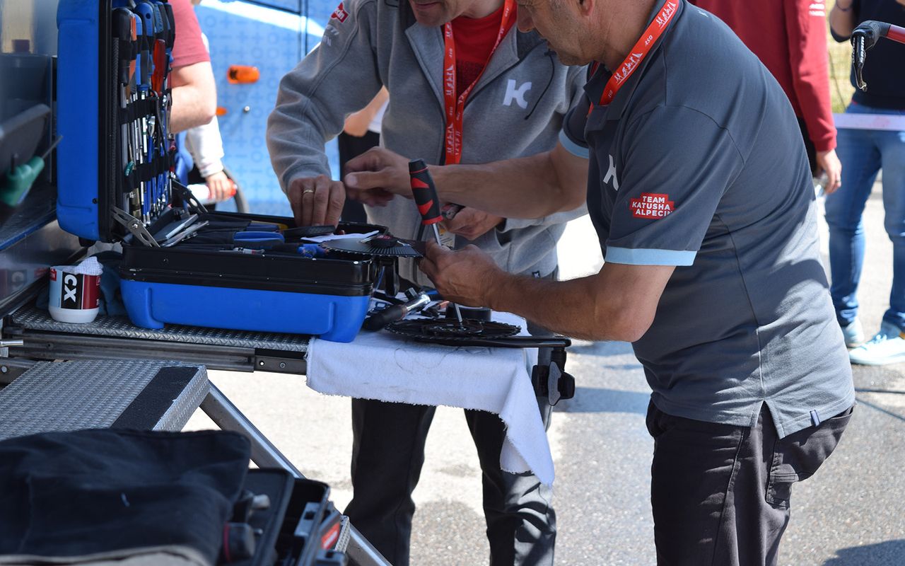 Katusha-Alpecin mechanics set up chainrings and cranksets ahead of the start