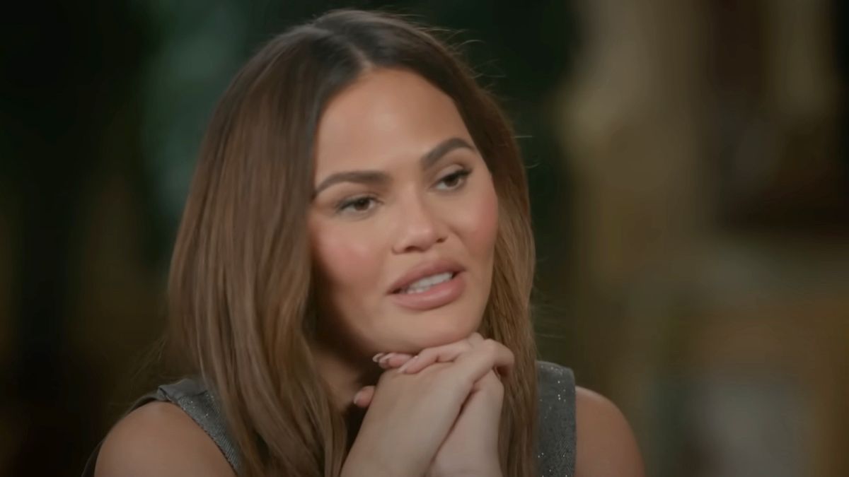 Chrissy Teigen talking to Henry Gates Jr. on Finding Your Roots