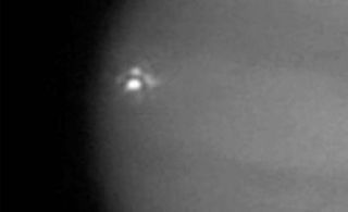 This image shows a close-up of the bright impact flash of an asteroid or comet slamming into Jupiter on Sept. 10, 2012.