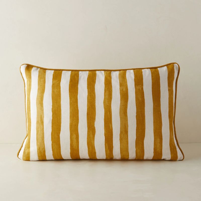 yellow and white striped cushion