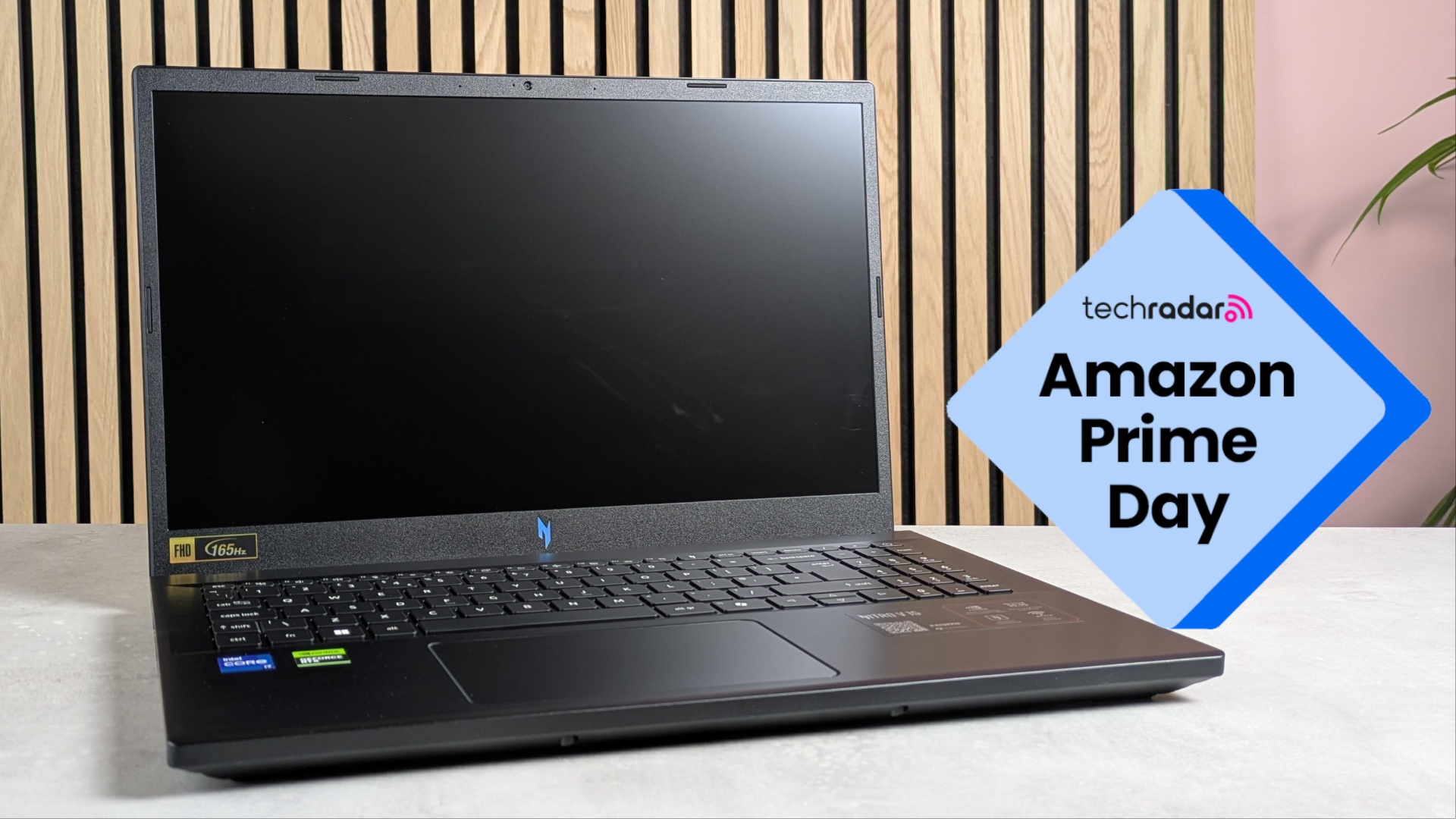 Acer Nitro V 15 gaming laptop on office desk with Amazon Prime Day logo overlaid