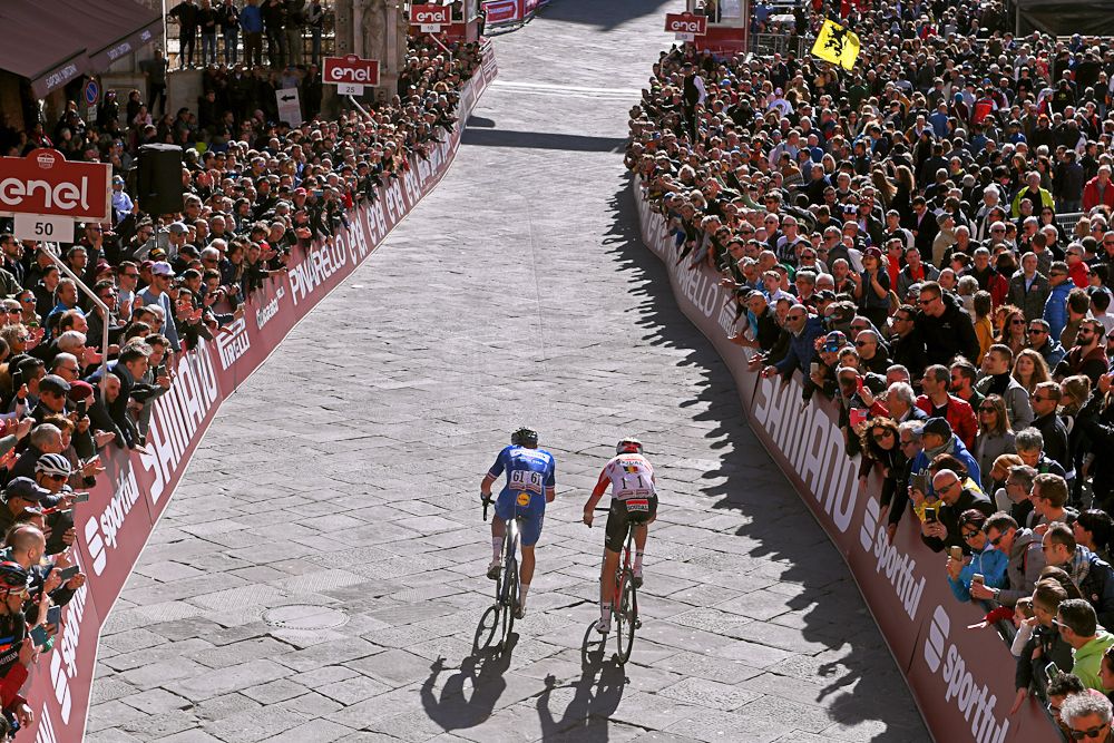 Julian Alaphilippe and Jakob Fuglsang sprint for the finish of Strade Bianche