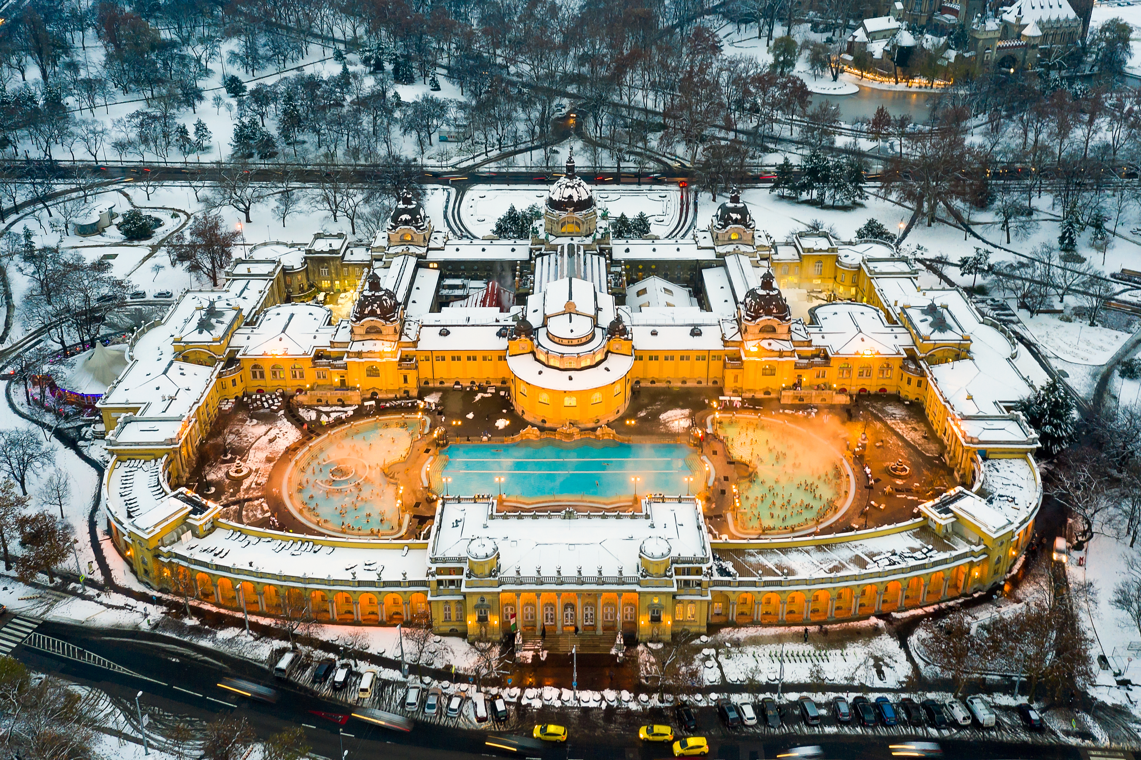 The Szechenyi Baths during winter covered in snow