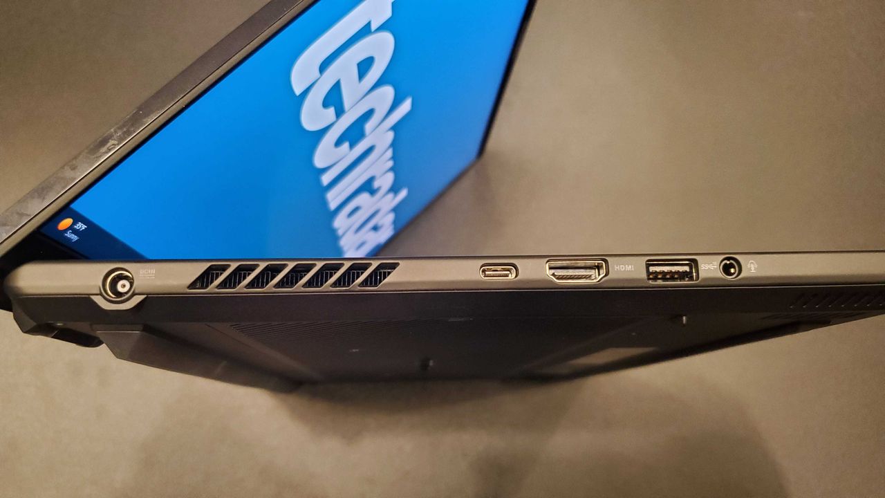 black gaming laptop on side
