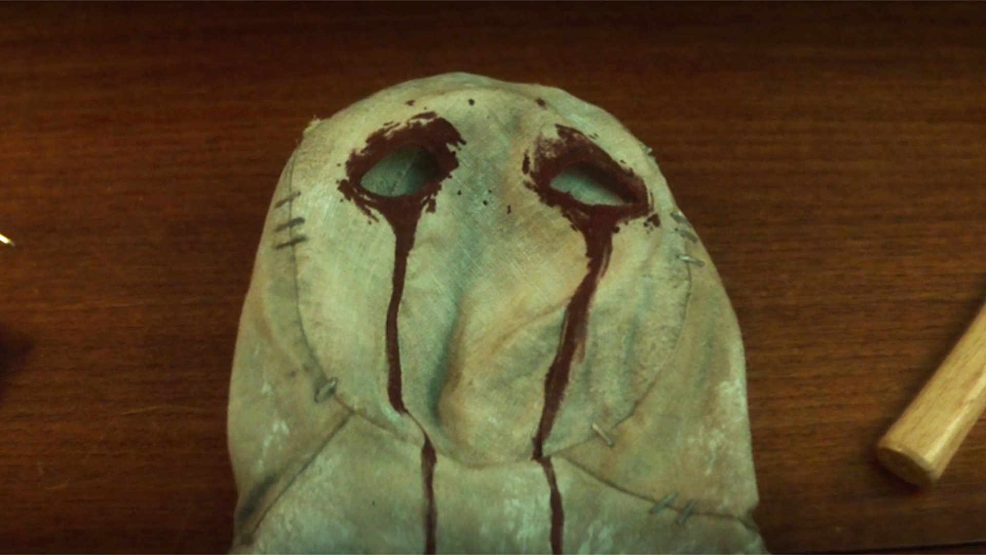 Muse's mask laying on a table