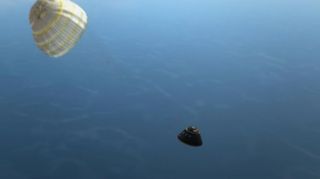 Drogue parachutes deploy to slow NASA's Orion space capsule down after re-entry in this still from an animation of the unmanned Exploration Test Flight 1 demonstration flight.