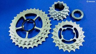 The cassettes have steel sprockets, built in two triplets plus six individual smaller sprockets
